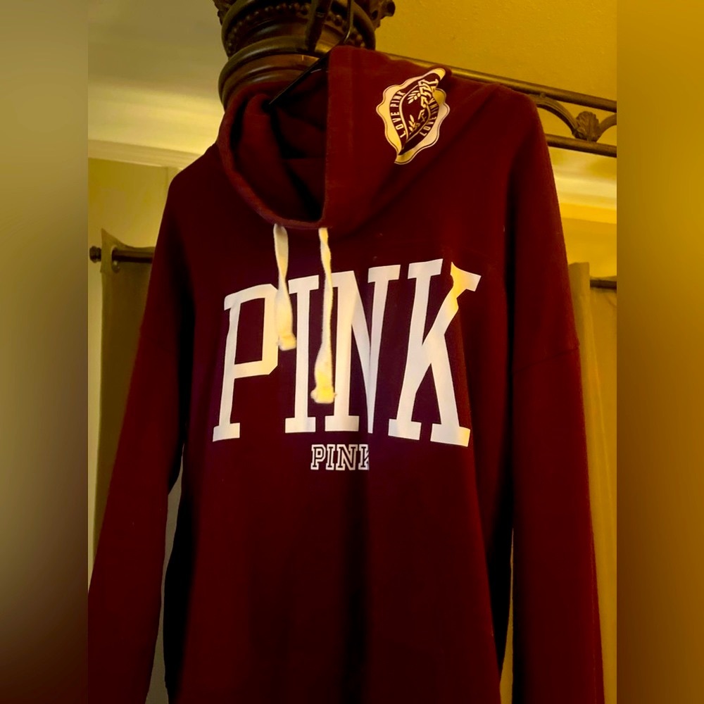 Pink sweater. Only worn a few times. Burgundy